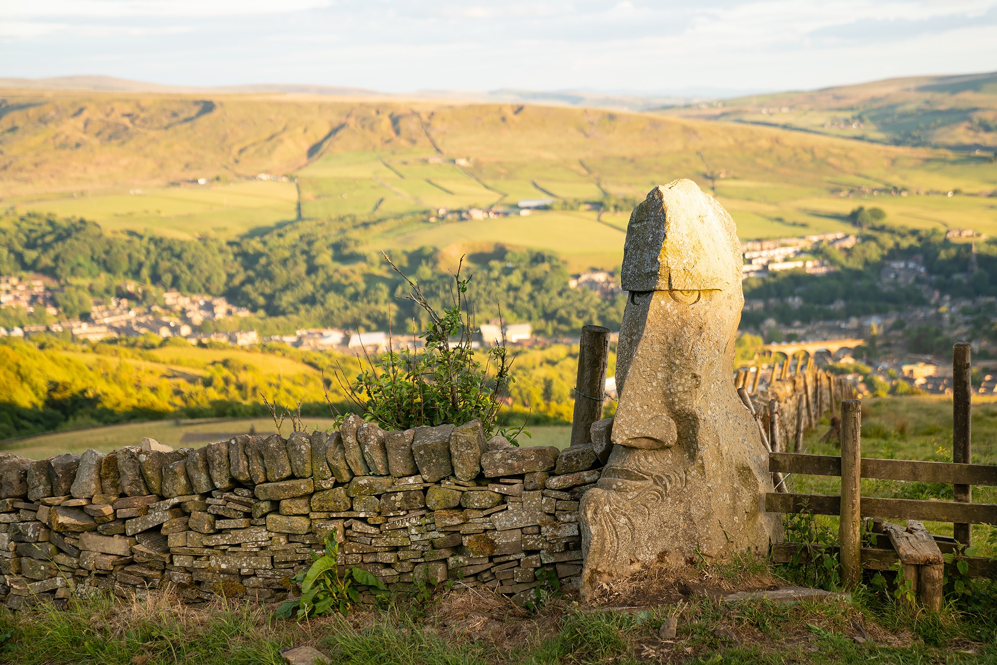 A stone carving sculpture of The Wizard of Whirlaw, on the moors above Todmorden.